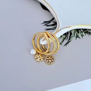 Tory Burch Gold Stackable Rings with Pearl and Logo Charms SIZE8